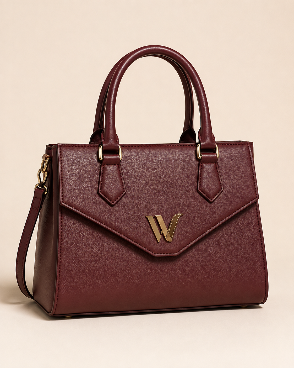 Gold Emblem Leather Handbag